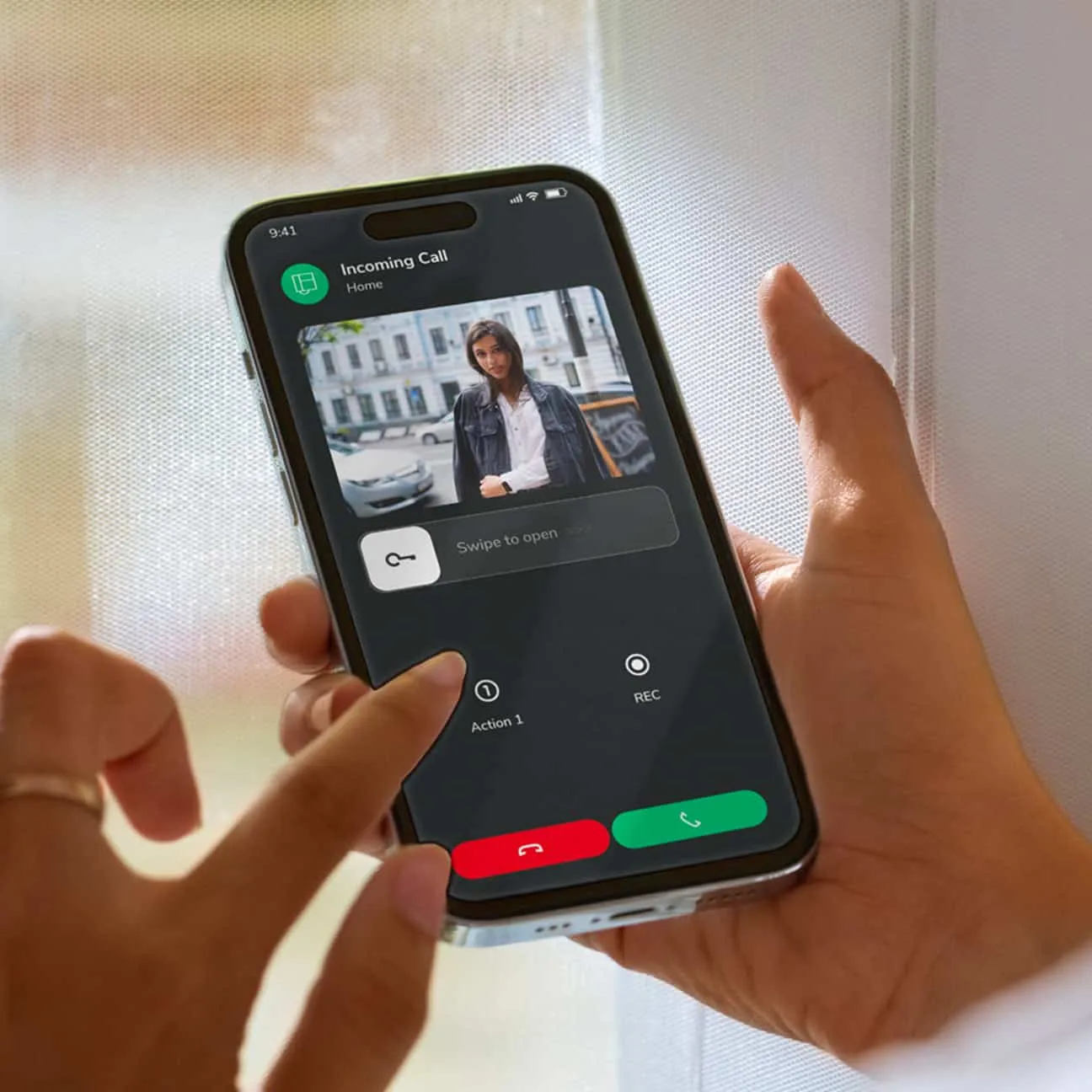 Incoming call interface on a smartphone for remote apartment access control.