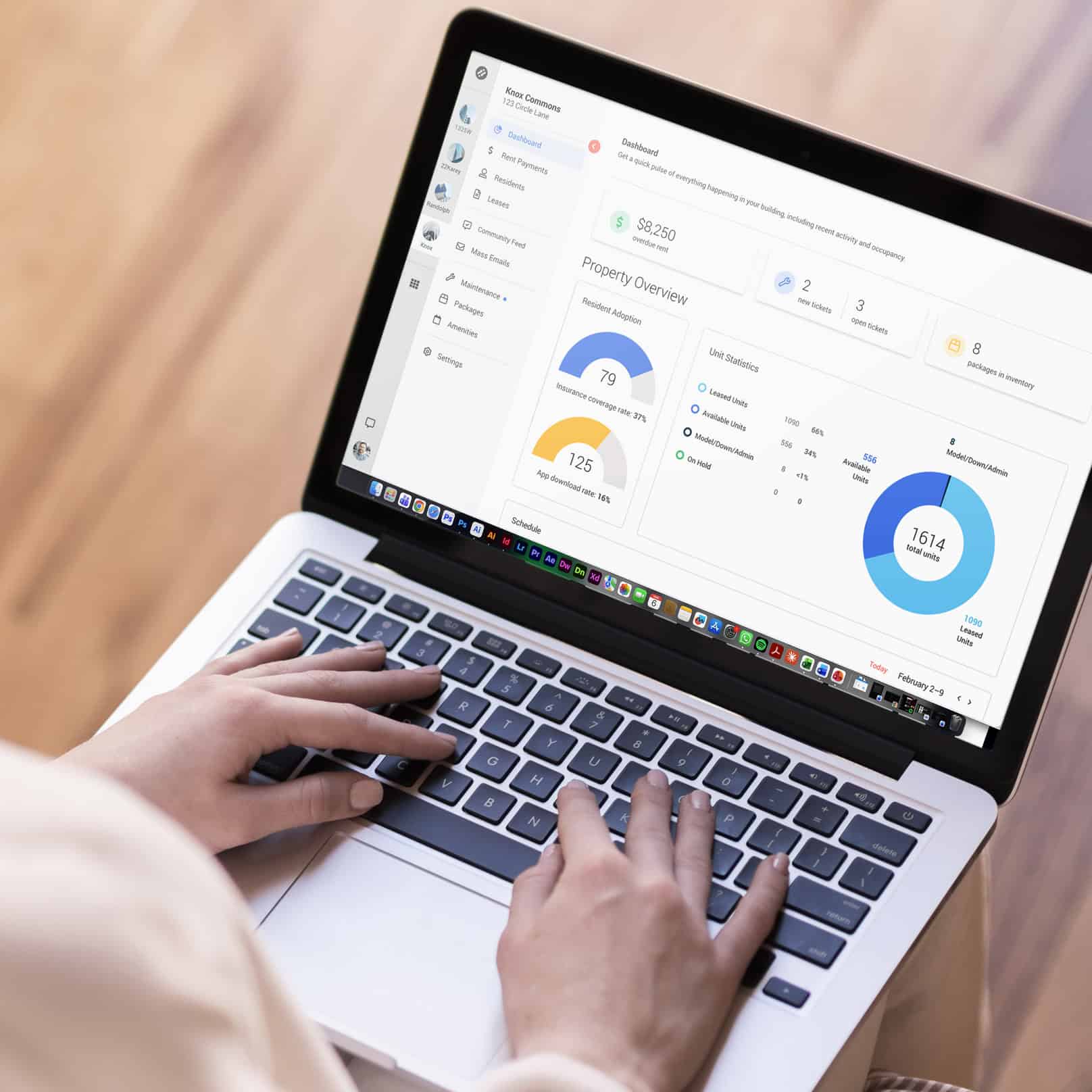 Comprehensive property management dashboard showing building statistics and resident adoption rates.