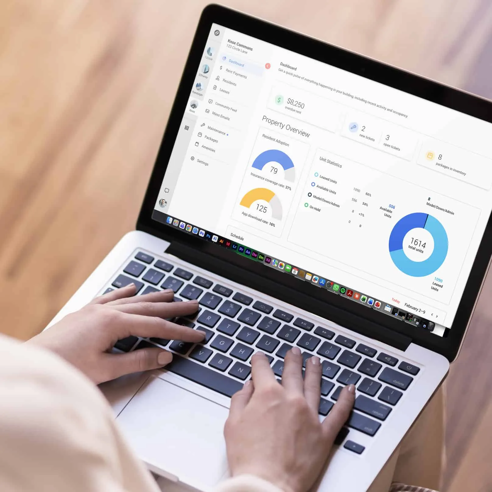 Comprehensive property management dashboard showing building statistics and resident adoption rates.