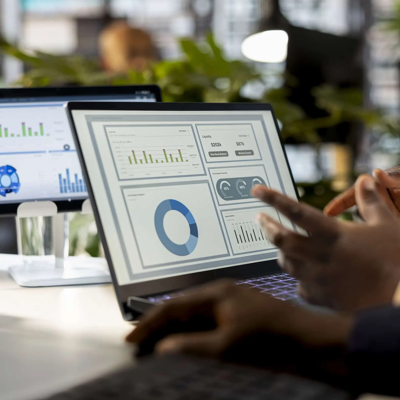 Laptop screen showing building analytics and portfolio-level insights.